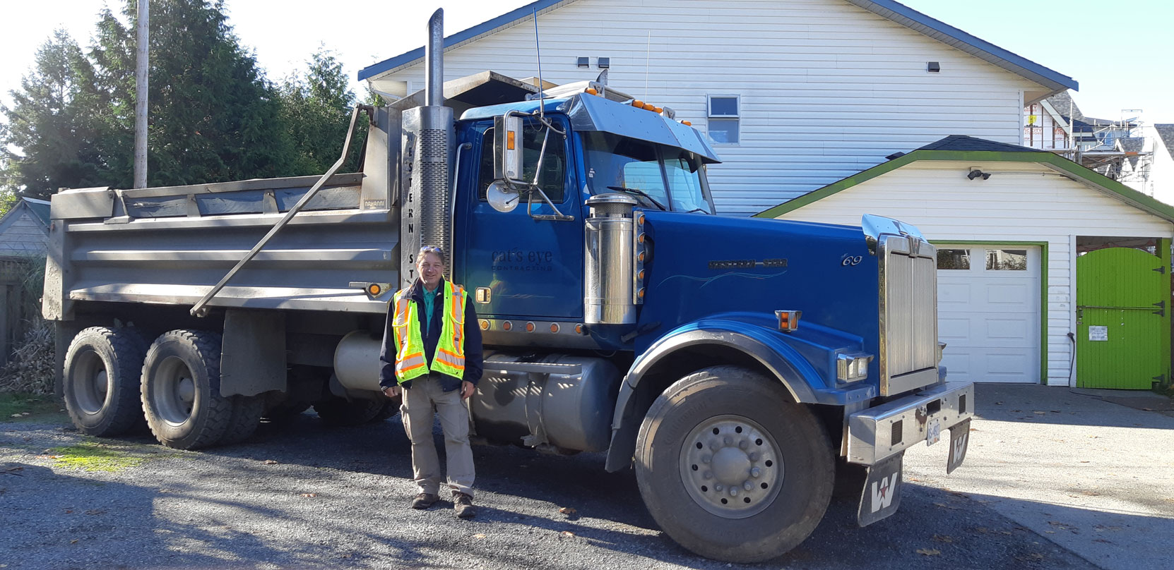 Coastal Pathways Driver Training Chief Instructor Mark Anderson teaching on a truck owned by a client, Cat's Eye Contracting, in Langford, October 2023 [photo: Coastal Pathways Driver Training]